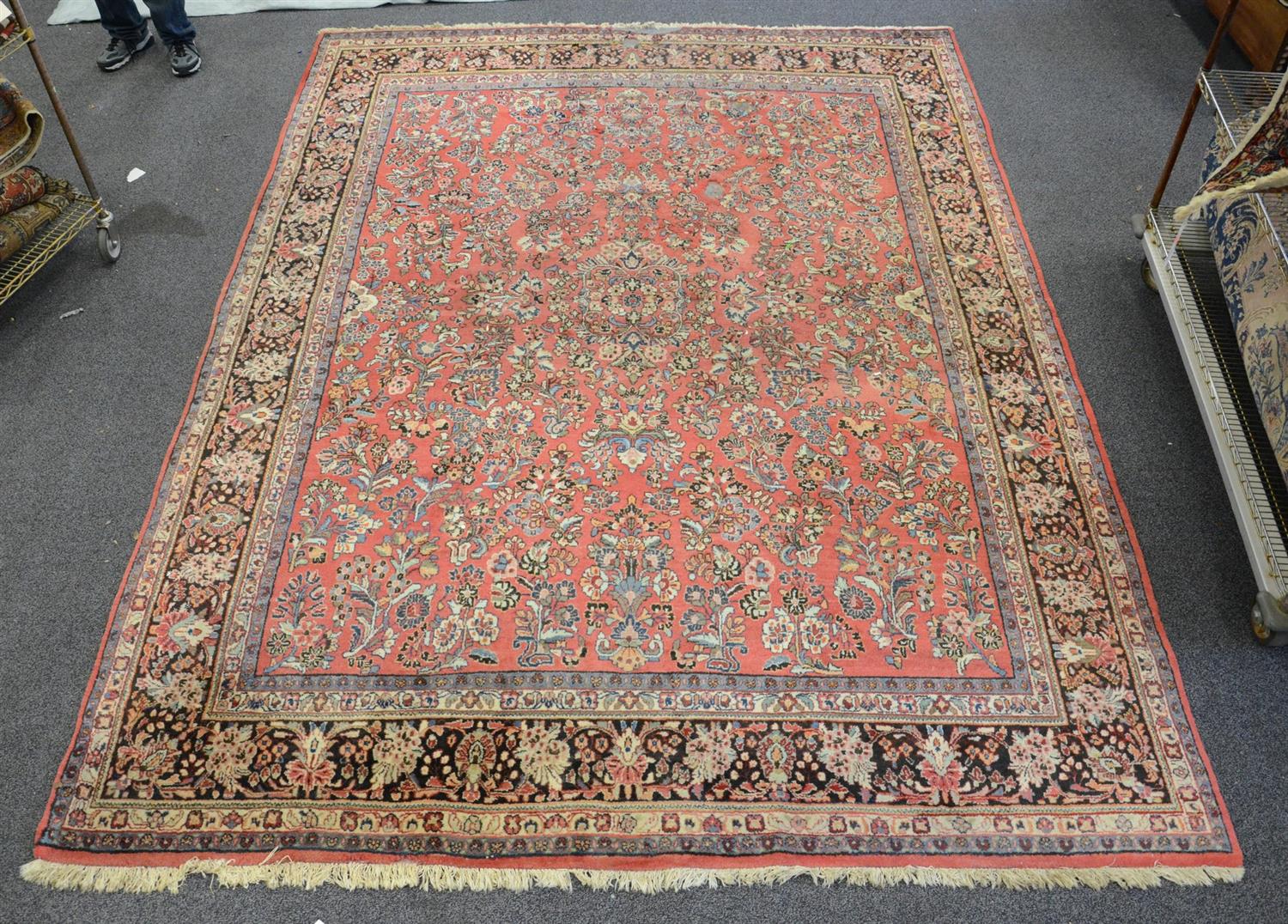 Appraisal: x Sarouk rug one end with considerable moth damage