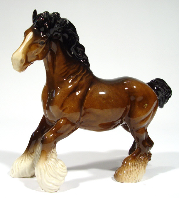 Appraisal: Beswich cantering Shire horse with hand painted brown decoration factory