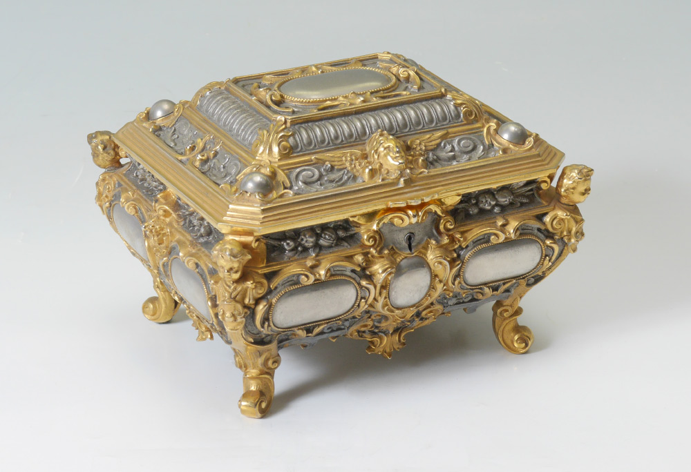 Appraisal: ROCOCO STYLE GILT METAL MUSICAL JEWELRY CASKET Mid th century