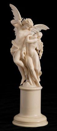 Appraisal: CONTINENTAL CARVED IVORY FIGURE GROUP CUPID AND PSYCHE The winged