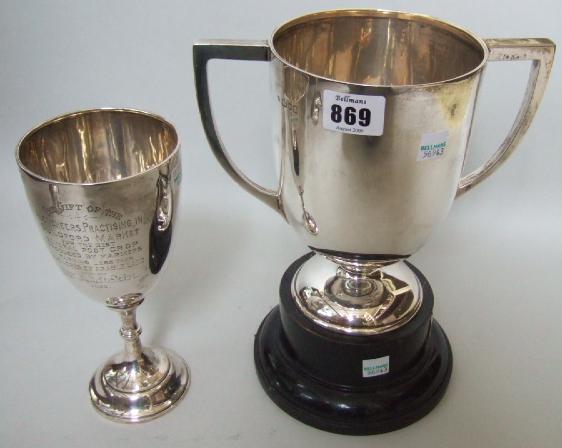 Appraisal: A silver twin handled plain trophy cup London date rubbed