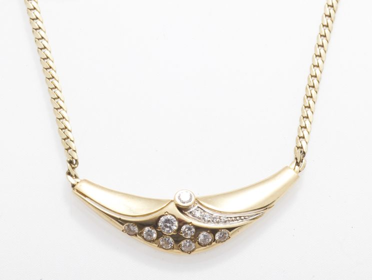 Appraisal: A diamond set necklace the curved pendant collet set throughout