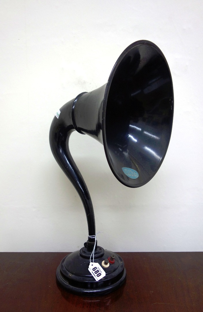 Appraisal: An Ultra horn shaped amplifying speaker cm circular base cm