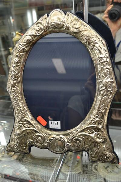 Appraisal: LARGE STERLING SILVER EMBOSSED OVAL PICTURE FRAME