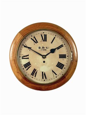 Appraisal: Railway Interest An oak cased wall clock the single fusee