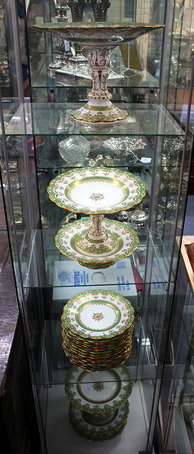 Appraisal: A VICTORIAN PORCELAIN DESSERT SERVICE with green banded and parcel