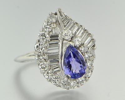 Appraisal: A Platinum Diamond and Tanzanite Dinner Ring Platinum mounting set