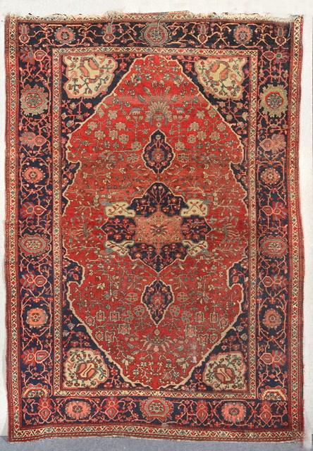 Appraisal: A JOZAN RED GROUND RUG the central medallion with all