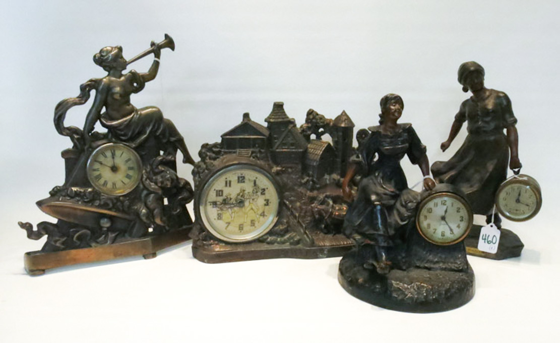 Appraisal: COLLECTION OF FOUR FIGURAL METAL MANTEL CLOCKS including a weighted