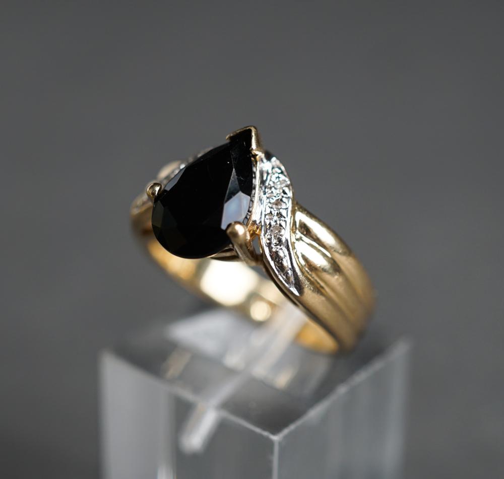 Appraisal: -KARAT YELLOW-GOLD ONYX AND DIAMOND RING GROSS DWT SIZE -Karat