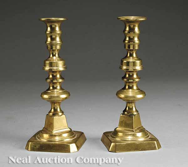 Appraisal: A Pair of English or American Push-Up Candlesticks each shaped