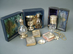 Appraisal: An Edward VIII silver cased travelling communion set London comprising