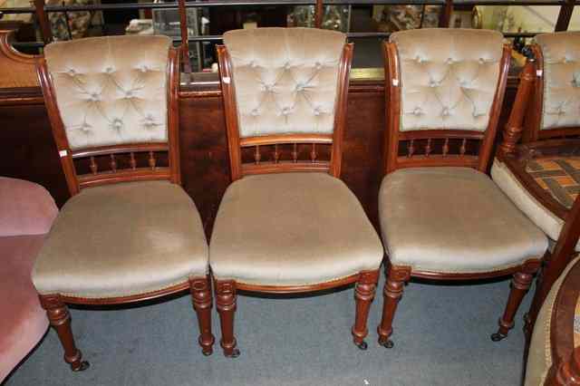 Appraisal: A SET OF SIX VICTORIAN WALNUT DINING CHAIRS with turned