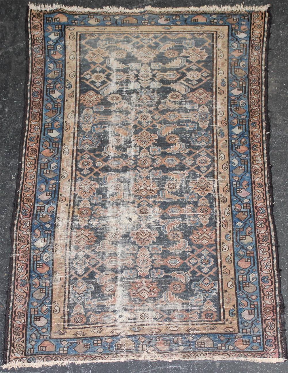 Appraisal: ANTIQUE SULTANABAD RUG indigo field with allover floral design within