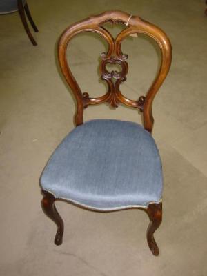 Appraisal: A SET OF FOUR VICTORIAN WALNUT DINING CHAIRS of balloon