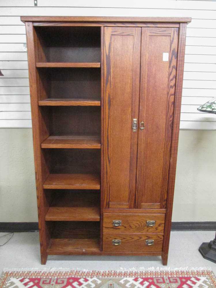 Appraisal: A CRAFTSMAN STYLE OAK WARDROBE American late th century the