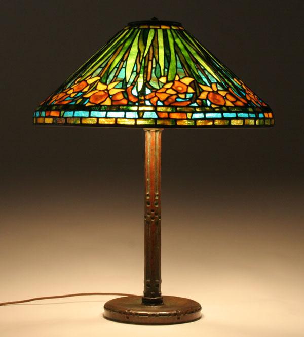 Appraisal: Leaded glass and bronze table lamp in a daffodil pattern