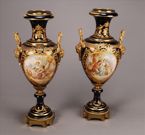 Appraisal: A pair of Continental gilt metal mounted Sevres style porcelain