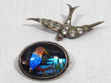 Appraisal: An Edwardian silver butterfly wing brooch depicting a kingfisher together