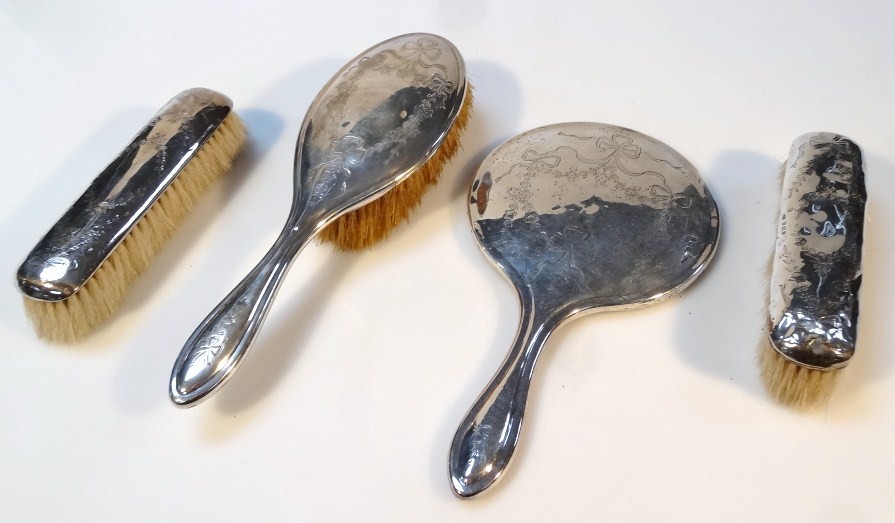 Appraisal: A harlequin Edwardian silver dressing table set by A J