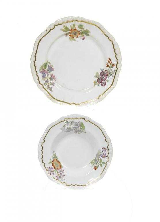 Appraisal: TWO ROCKINGHAM PLATES AND A DESSERT DISH of Gadroon with