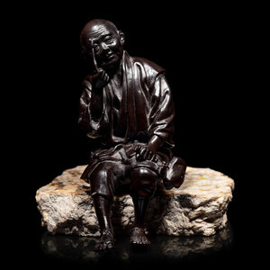 Appraisal: A Bronze Okimono of an Elderly Man TH CENTURY the