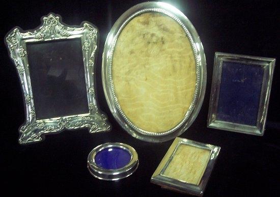 Appraisal: An oval picture frame cm high Birmingham another chased with