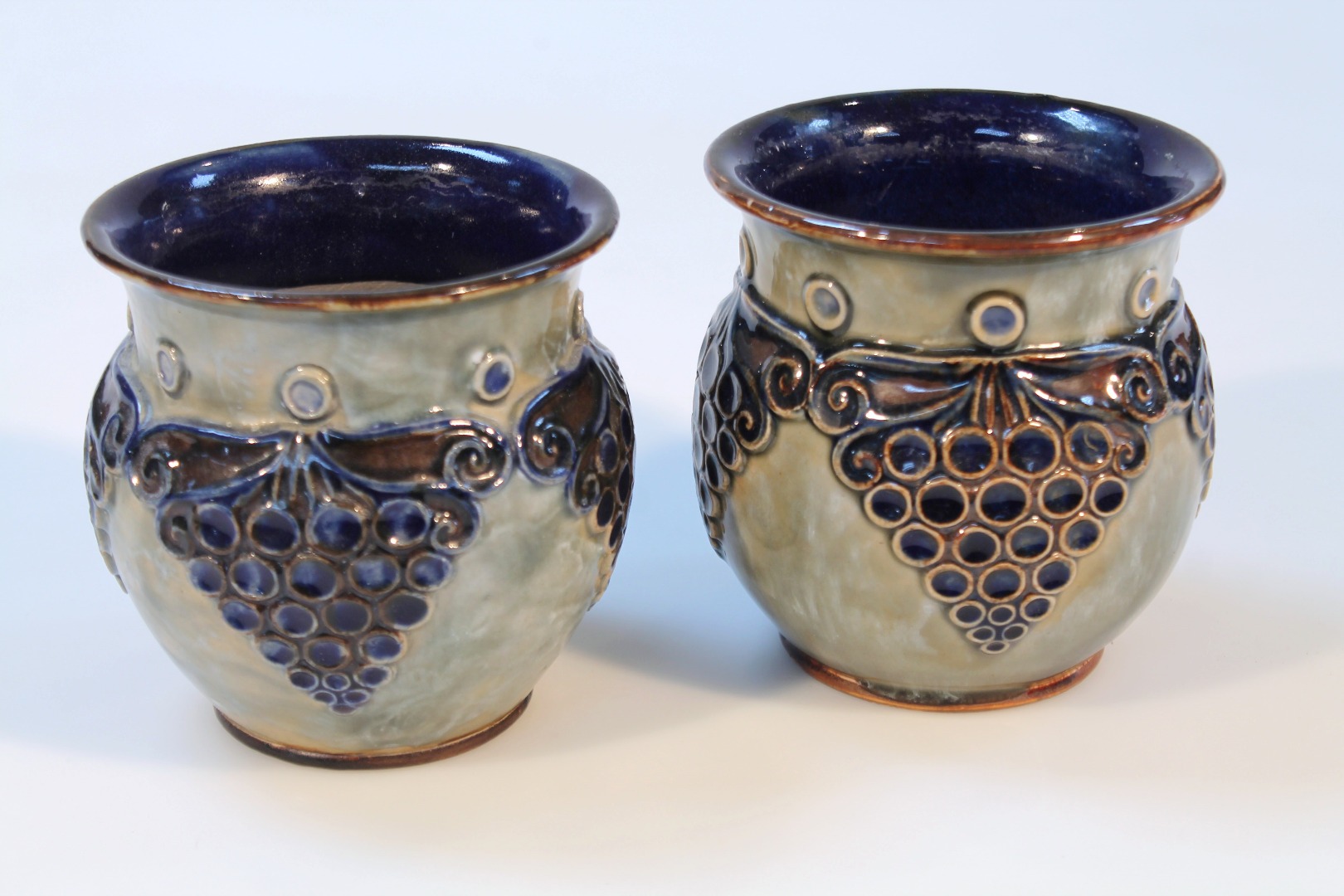 Appraisal: A pair of early thC Royal Doulton stoneware vases each