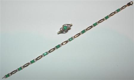 Appraisal: An emerald and diamond set ring and matching bracelet the