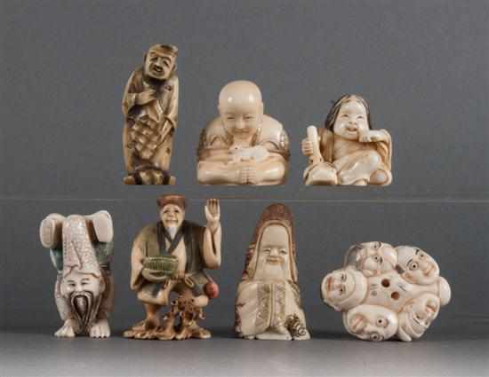 Appraisal: Seven Japanese carved ivory netsukes including girl with demon mask