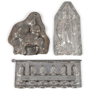 Appraisal: Three Father Christmas Candy Molds Late th Early th Century