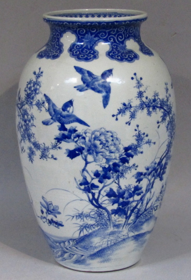 Appraisal: A thC Japanese Meiji period blue and white earthenware vase