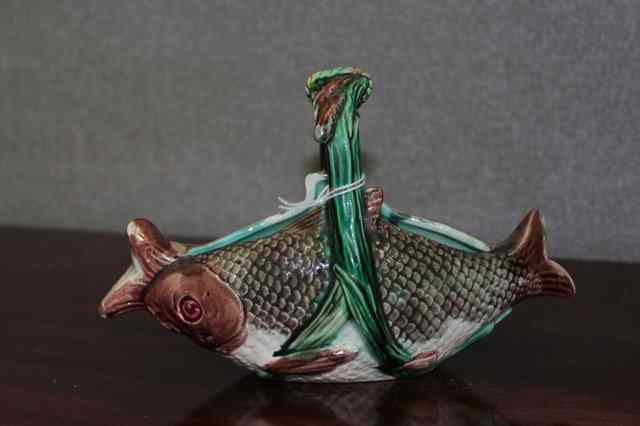 Appraisal: A VICTORIAN MAJOLICA SMALL FISH MOULDED BASKET handle restored with