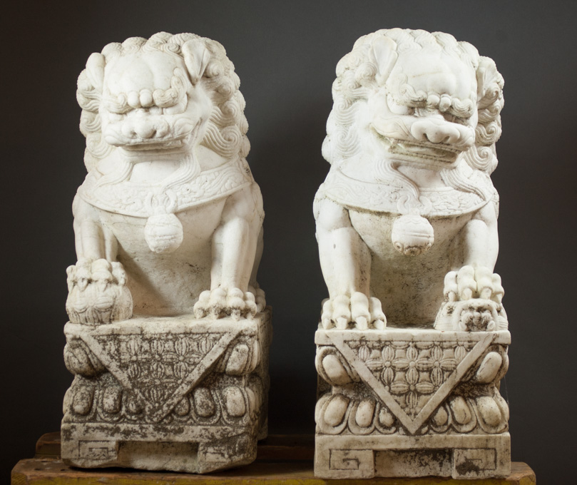 Appraisal: A PAIR OF MING STYLE WHITE MARBLE FOO LIONS Chinese