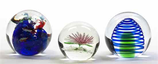 Appraisal: Three Glass Paperweights each of spherical form one depicting a