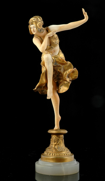 Appraisal: AN ART DECO GILT BRONZE AND IVORY 'HINDU DANCER' FIGURE