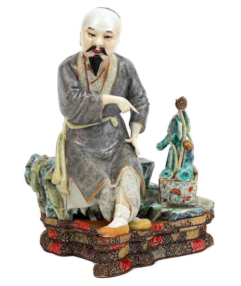 Appraisal: Chinese Porcelain Figure on Fabric Covered Base Chinese porcelain figure