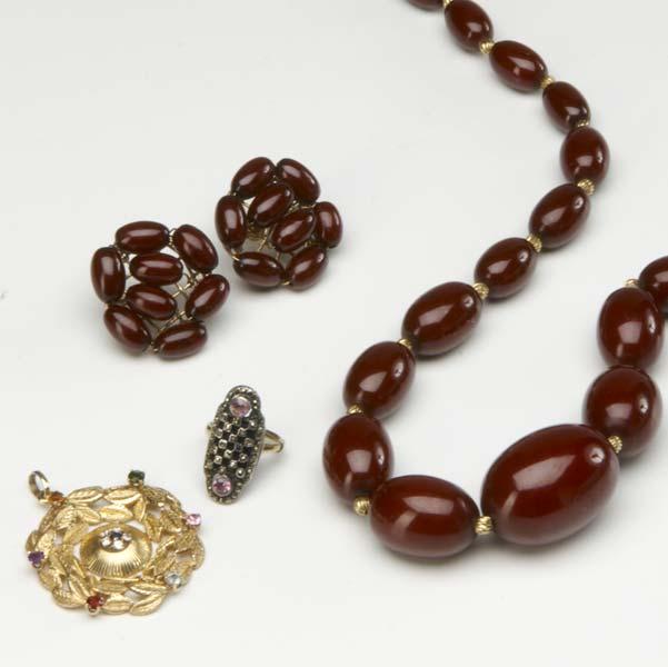 Appraisal: th C JEWELRY Includes red Bakelite bead necklace and matching