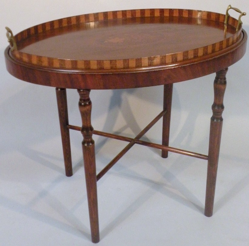 Appraisal: An Edwardian mahogany boxwood and painted tea tray the oval