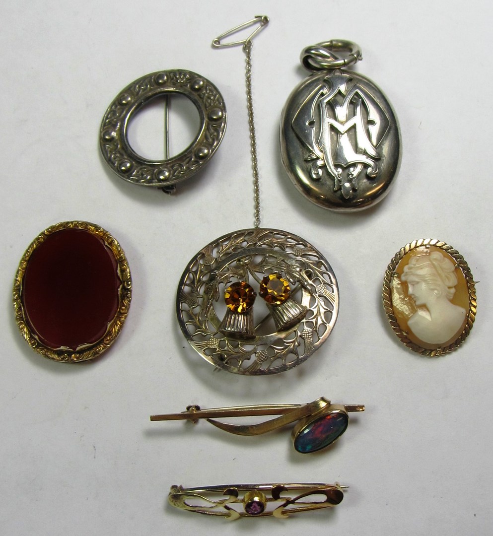 Appraisal: A Sterling silver and yellow paste set brooch with thistle