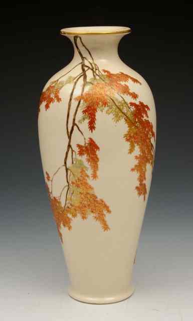 Appraisal: A JAPANESE SATSUMA TAPERING VASE with delicate gilded leaf designs