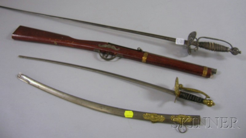 Appraisal: Two Toy Weapons and a Spanish-style Steel Sword a wood