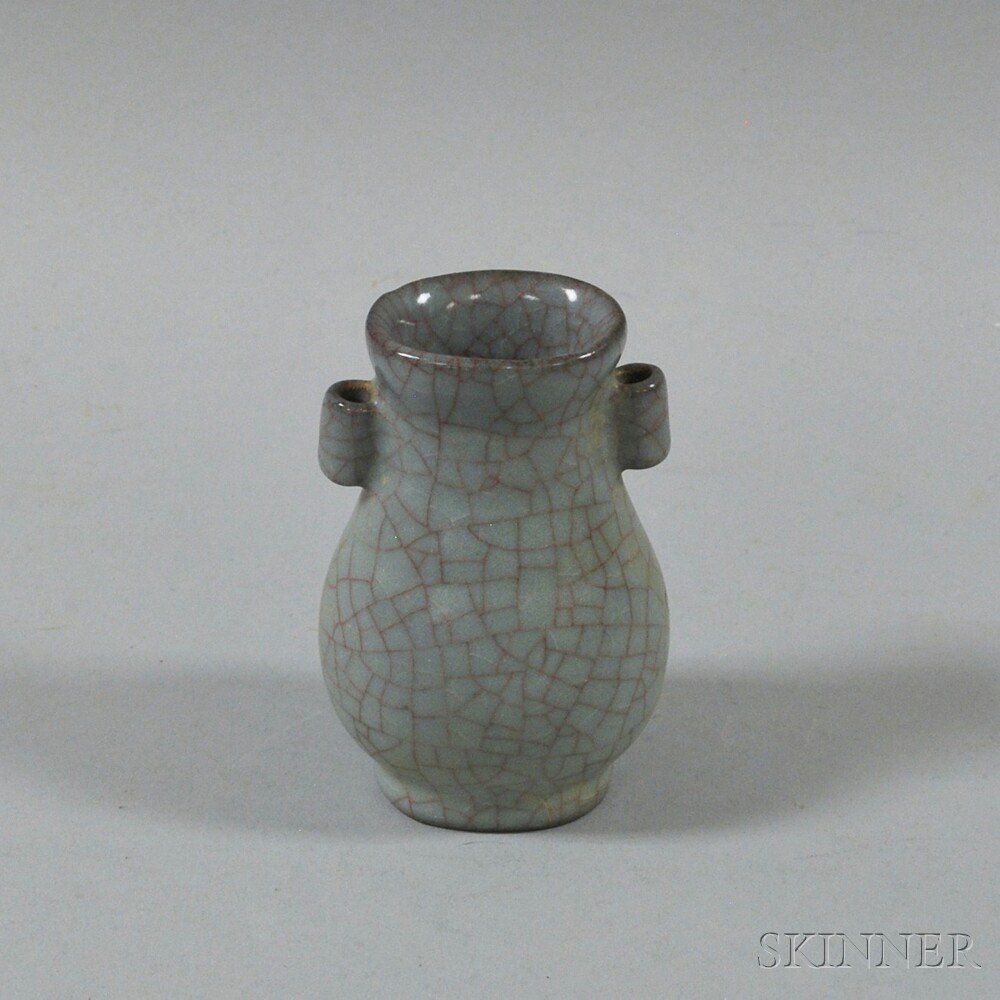 Appraisal: Chinese Small Celadon Crackle-glazed Vase th th century hu form