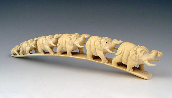 Appraisal: CARVED IVORY ELEPHANT BRIDGE elephants getting progressively larger unsigned Carved