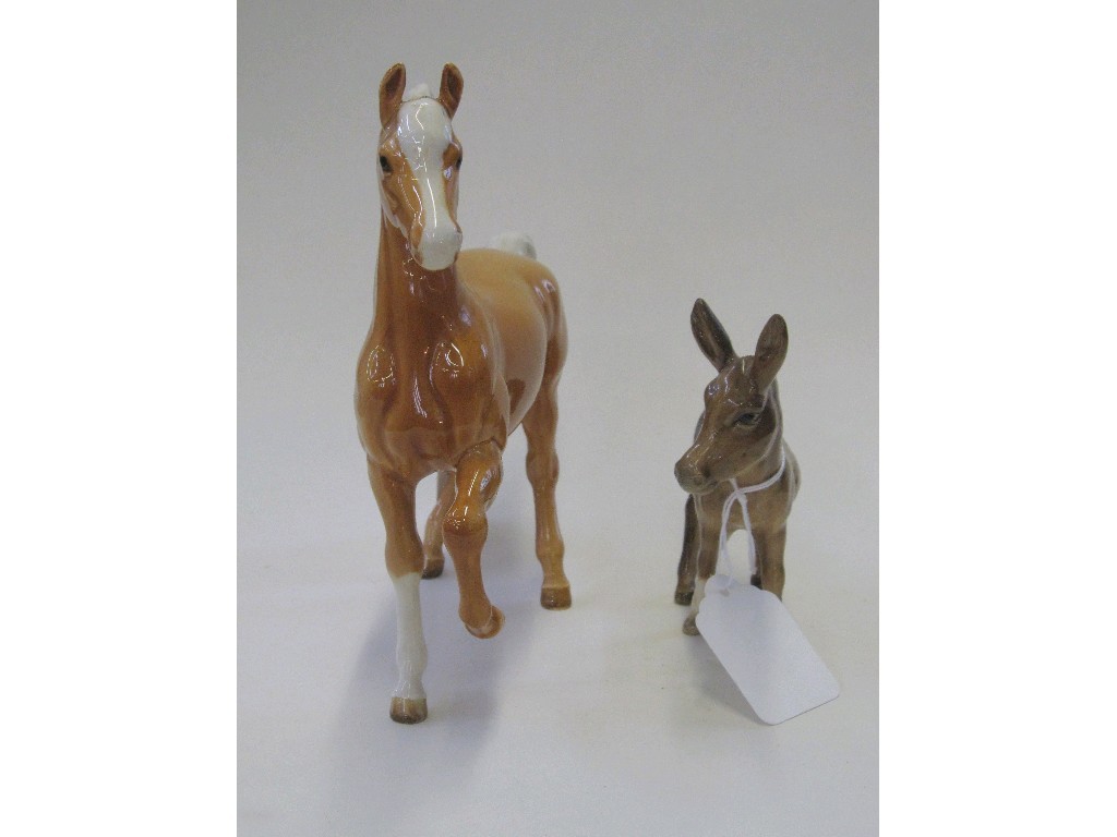 Appraisal: Beswick Palomino prancing Arab type horse model no and a