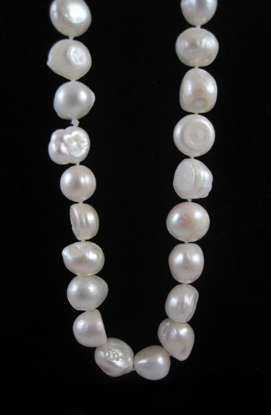 Appraisal: BAROQUE WHITE PEARL NECKLACE measuring inches in length and strung