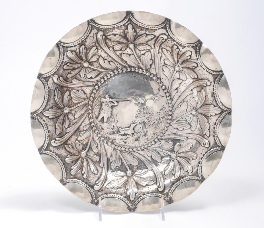 Appraisal: PORTUGESE STERLING EMBOSSED HUNTING SCENE BOWL Scalloped rim over embossed