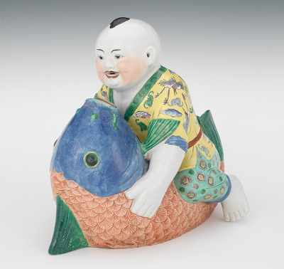 Appraisal: Large Porcelain of Boy Wrestling a Koi Large amusing porcelain