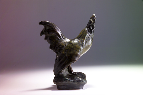 Appraisal: AMPHORA Rooster figurine covered in a bronzed glaze Small grinding