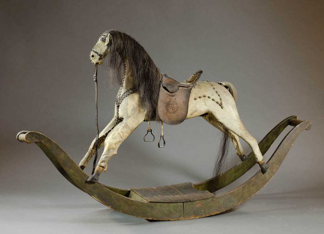 Appraisal: EARLY ROCKING HORSE late th early th century horse hide